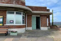 The double doors into Linda's Stores becomes the fire exit